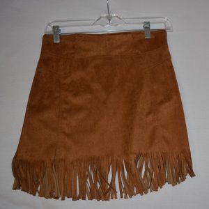 Faux Sued fringe skirt.new. Never worn